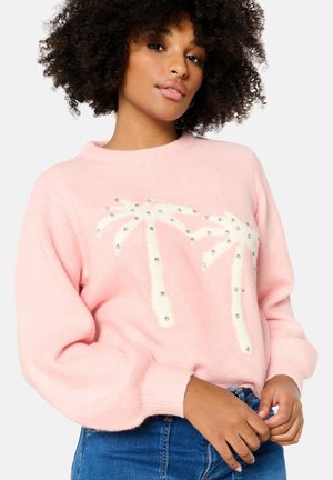 Maglione rosa chiaro con vestibilità comoda. Presenta un design di palme in bianco decorato con strass. Tessuto morbido e testurizzato.