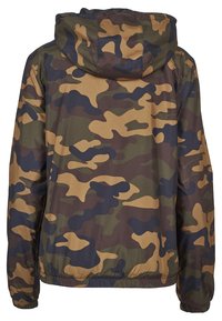 Camouflage jacket in earthy tones of green, brown, and tan. Features a hood, elastic cuffs, and hem, with a smooth, lightweight texture.