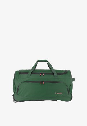 Green duffel bag with black accents, dual top handles, two zippered compartments, roller wheels, and a logo on the side.
