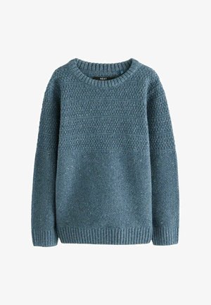 Mėlynas megztinis su tekstūruotu raštu, sukančiu kaklu ir įstatytu apvadu. Pagamintas iš storos, minkštos medžiagos.