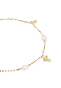 Gold chain necklace featuring white pearls and a trinity knot pendant, with round and oval beads, creating a delicate, textured design.