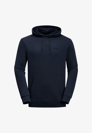 Haut à capuche en coton bleu marine avec une poche kangourou, un capuchon à cordon de serrage et un petit logo sur la poitrine. Manches longues avec des poignets côtelés.