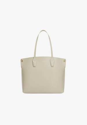 Sac cabas beige Furla avec deux anses, forme rectangulaire et petits accents dorés du logo à l’avant et aux coins.