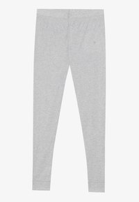 Ljust grå leggings tillverkade av mjukt bomullsmaterial. Har en enkel design, elastisk midja och åtsittande ben utan synliga mönster.