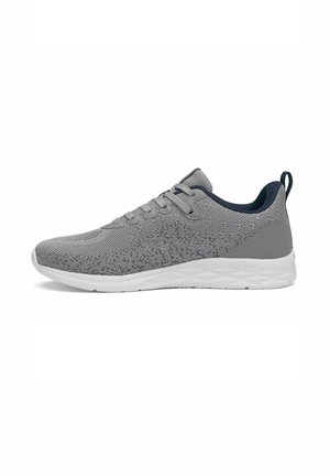 Scarpa da ginnastica grigia in maglia con suola bianca, design con lacci, collarino imbottito e linguetta sul tallone, vista laterale.