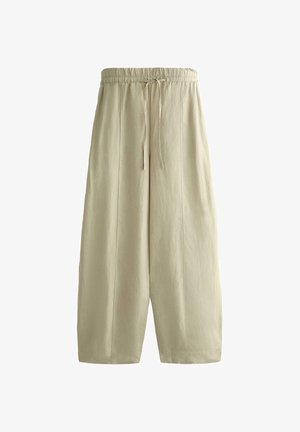 Beżowe szerokie spodnie o kroju cropped z elastycznym paskiem w talii i troczkiem, z pionowymi szwami z przodu.