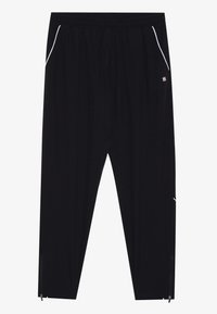 Pantalones deportivos negros con un corte relajado, cinturilla elástica, bolsillos laterales y detalle de ribete blanco. Cuenta con dobladillos con cremallera en los tobillos.