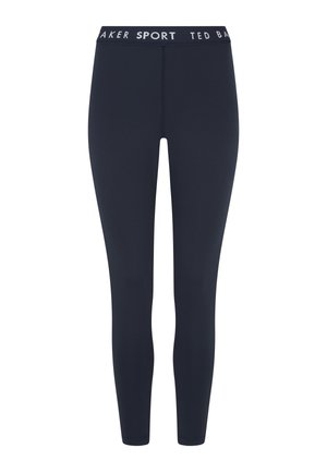 Marineblaue Leggings mit glatter Textur, elastischem Bund mit weißem "TED BAKER SPORT" Schriftzug. Eng anliegendes Design, geeignet für sportliche Aktivitäten.