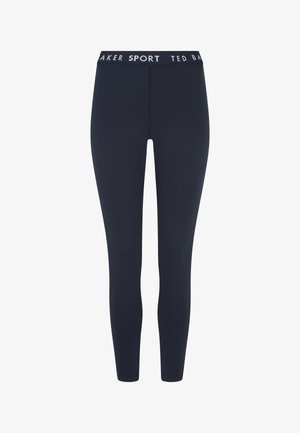 Navy leggings with a smooth texture, elastic waistband featuring white "TED BAKER SPORT" branding. Fitted design suitable for active wear.