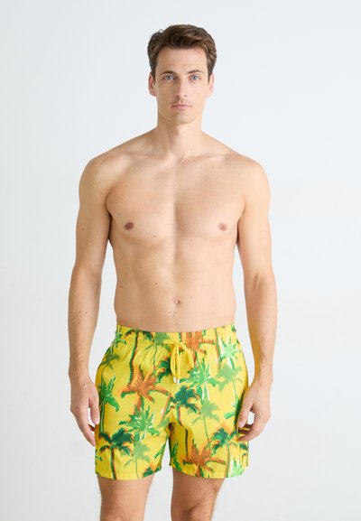 Herren Badehosen in leuchtendem Gelb mit einem tropischen Palmenbaum-Print. Verfügt über einen elastischen Bund mit Kordelzug. Aus leichtem Stoff gefertigt.