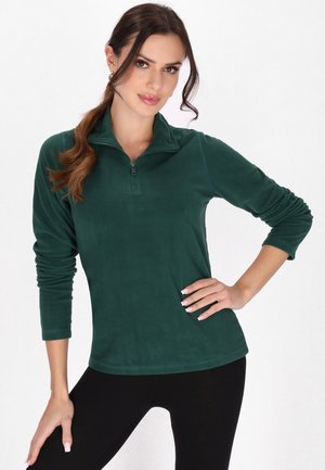 Groene fleece-hoodie met een ritssluiting bij de kraag, lange mouwen en een zachte textuur. Ontworpen voor een losse pasvorm met een afgeronde zoom.