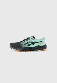 Black and turquoise running shoe with black logo, multicolor sole in orange, turquoise, and black, and lace-up closure.