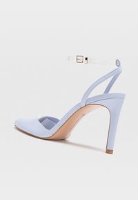 Stradivarius Korolliset sandaalit - light blue