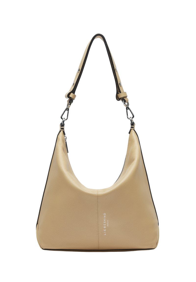 Hobo-Tasche aus beigem strukturiertem Leder mit schwarzem Besatz. Verfügt über eine abgerundete Form, einen verstellbaren Riemen und silberne Hardware-Akzente.