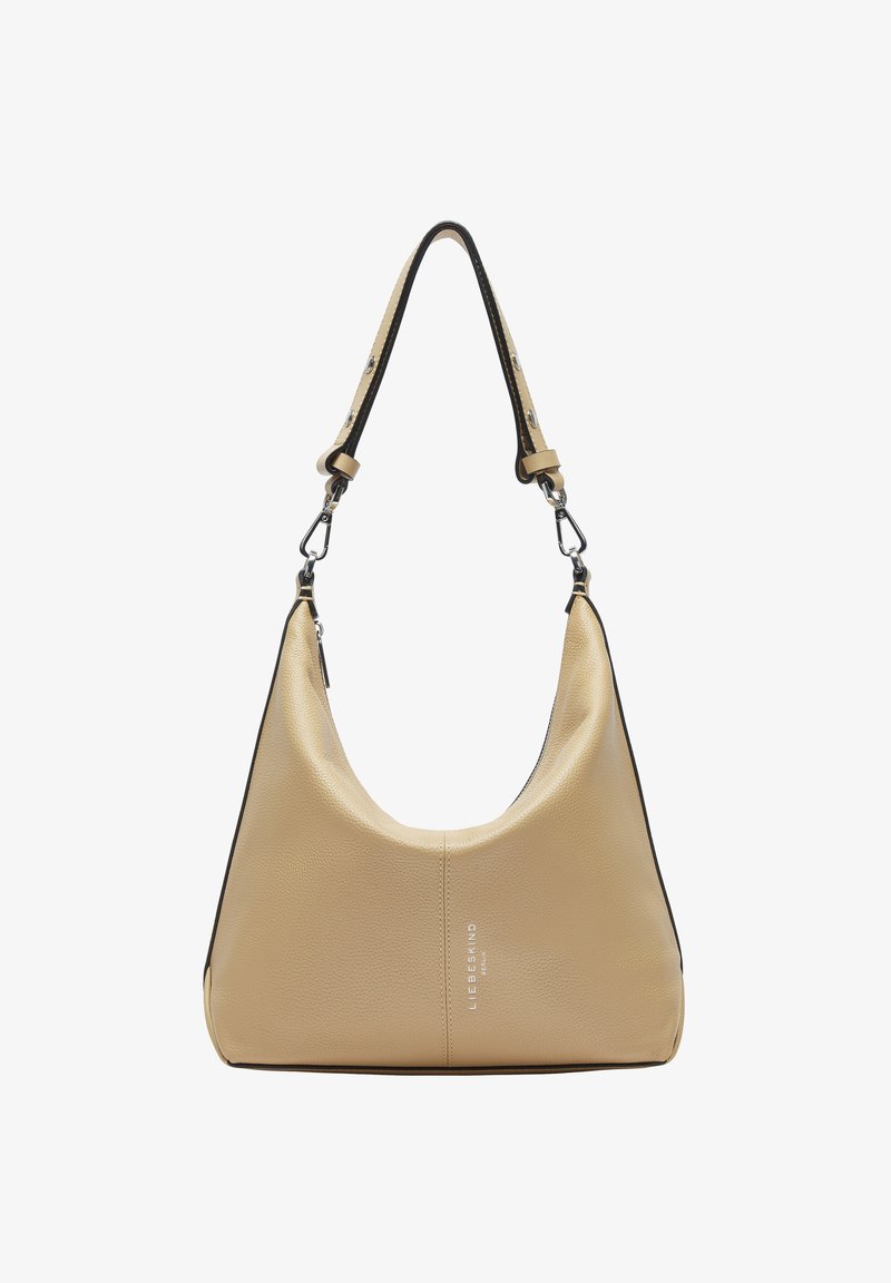 Sac hobo en cuir texturé beige avec des finitions noires. Présente une forme arquée, une bandoulière réglable et des accents en métal argenté.