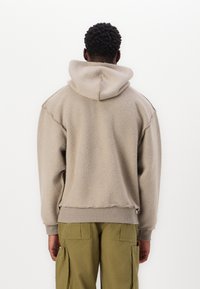 Pal Sporting Goods HOLE GUARD HOODIE UNISEX - Pulover iz flisa - clay