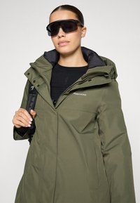 Didriksons SELINA Winter coat deep green/khaki