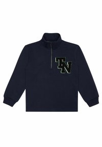 Sudadera de cremallera en azul marino con cuello alto, mangas largas y un gran logo bordado en negro y verde "TN" en el pecho. Textura de tela suave.