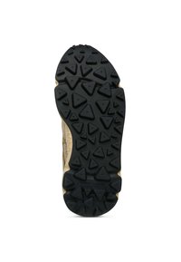 Semelle d'une chaussure avec des clous triangulaires pour une bonne adhérence. La semelle est noire avec un motif texturé ; la partie supérieure est de couleur beige clair avec une finition lisse.