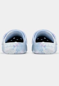 Blue and white patterned clogs with a textured surface, open backs, and multiple ventilation holes. Soft material with a flexible design.