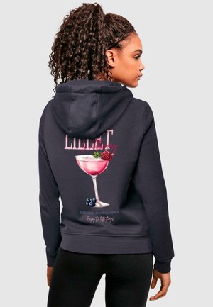 Dark navy hoodie featuring a colorful cocktail graphic on the back, with fruit accents and text that reads "Enjoying the little things."