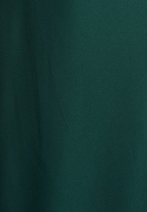 Dark green fabric with a smooth texture and slight sheen; no patterns or notable details visible. A solid and uniform appearance.