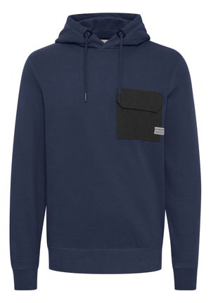 Navy blue hoodie made of soft fabric, featuring a black patch pocket on the left chest with a label, adjustable drawstring, and ribbed cuffs.