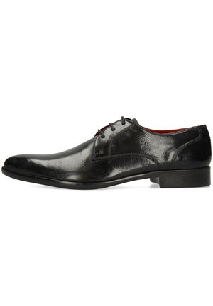 Black leather dress shoe with a sleek design, rounded toe, subtle texture, and low profile. Features two eyelets and a smooth sole.