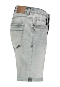 Grey denim shorts with a rolled hem, featuring a leather patch on the waistband and multiple pockets, including a small side pocket.