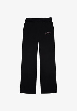 Czarne spodnie o szerokich nogawkach wykonane z miękkiego materiału z elastycznym paskiem w pasie. Posiadają małe różowe logo na dolnej lewej stronie przodu.