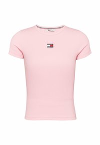 Pink fitted t-shirt made of ribbed fabric, featuring a small branded logo in red, white, and blue on the chest, with a round neckline.