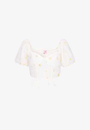Witte cropped blouse met pofmouwen, geel-wit madeliefjesprint, vierkante halslijn en twee voorste aantrekkoorden.