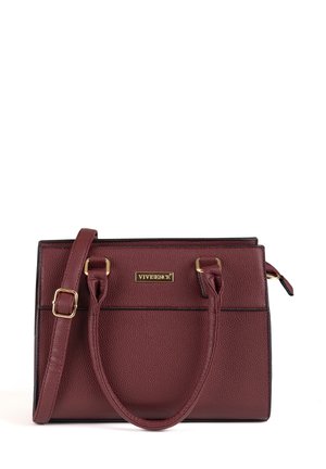 Burgundy leather handbag with gold hardware, structured design, two handles, and a detachable shoulder strap. Textured surface with logo detail.