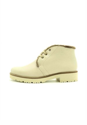 Botines de cuero beige con un cuello de textura suave, punta redonda y suela de goma con un tacón bajo de bloque y diseño de cordones.