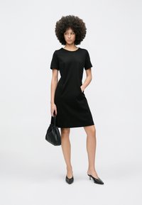 Marc Cain Rochie din jerseu - black