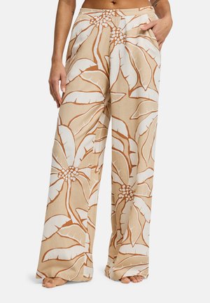 - Spodnie materiałowe