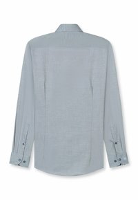 Light blue button-up shirt with long sleeves, textured fabric, and contrasting button accents on cuffs and collar band.