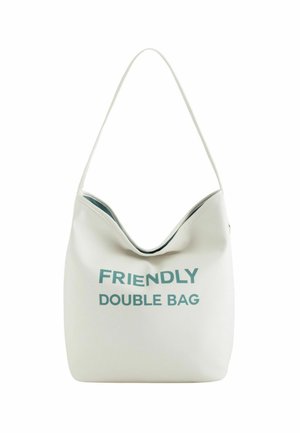 Weiße vegane Leder-Tasche mit einer geschwungenen Oberseite, die den Text "FRIENDLY DOUBLE BAG" in Türkis trägt, glatte Textur und einen einzelnen Schultergurt.