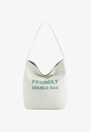 Weiße vegane Leder-Tasche mit einer geschwungenen Oberseite, die den Text "FRIENDLY DOUBLE BAG" in Türkis trägt, glatte Textur und einen einzelnen Schultergurt.
