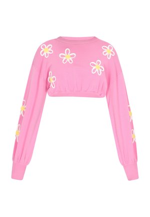 Ružičasti skraćeni zimski top dugih rukava od mekanog materijala, s bijelim i žutim izvezenim tratinčicama sprijeda i na rukavima, s detaljem naboranog donjeg ruba.