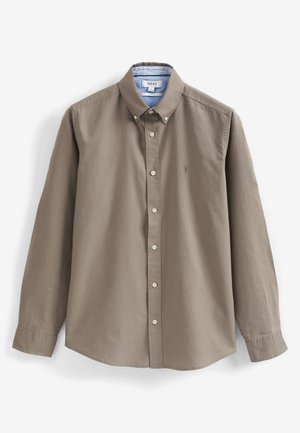 Khaki long-sleeve shirt with a button-down collar, made of soft cotton. Features a small embroidered logo and white buttons.