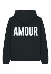 Felpa nera con cappuccio caratterizzata dalla scritta "AMOUR" in grande bianco sul retro, realizzata in morbido tessuto, con tasca a marsupio e cappuccio regolabile.