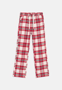 Red and white plaid pajama pants with green accents, elastic waistband, drawstring, and side pockets laid flat on a white background.