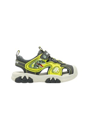 Sandalo per bambino grigio e giallo con punta aperta, design a motivo dinosauro, cinturino a strappo e suola strutturata.
