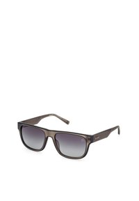 Occhiali da sole con lenti scure a gradiente e montatura in plastica marrone opaco. Forma rettangolare con un lieve marchio sulla tempia.