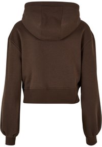 Brun cropped hettegenser med snøring, lange ermer med ribbestrikkede mansjetter og ribbestrikket nederkant. Myk stofftekstur og ren design.