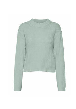 Suéter de color verde claro con relieve, de manga larga y cuello alto redondeado. La tela parece suave, con un acabado texturizado.