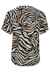 Top a maniche corte con un motivo a strisce zebrate in nero, marrone e crema. Tessuto morbido con vestibilità morbida e dettaglio di una tasca posteriore.
