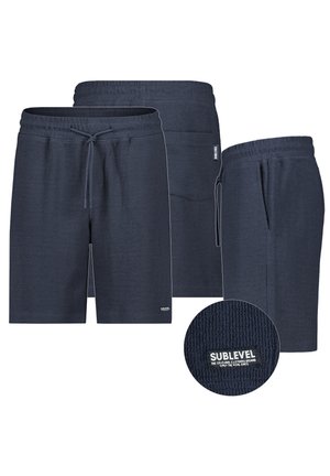Dark blue textured fabric shorts with elastic waistband, front and back pockets, drawstring, and small "Sublevel" brand label.