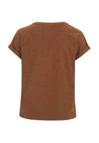 Haut marron à manches courtes en tissu texturé. Il présente un col rond et des poignets repliés, avec une coupe décontractée et un ourlet droit.